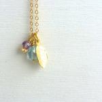 Leaf Charm Necklace In Gold Filled With Aquamarine..
