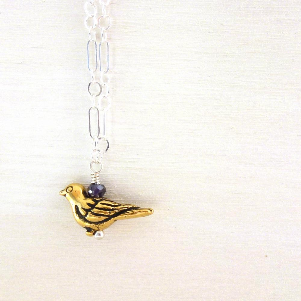 Bird Charm Necklace In Sterling Silver And Brass